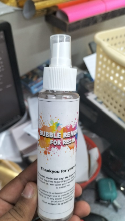 Bubble removal spray