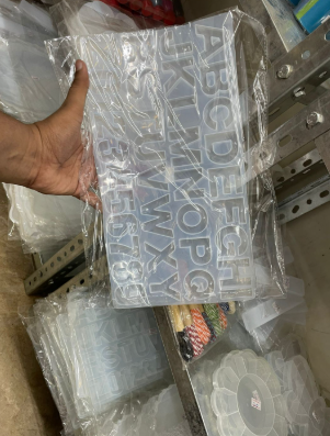 Alphabet mould with hole